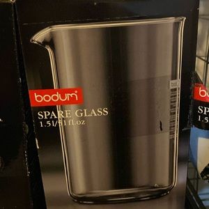 Two Bodum French press replacement carafes.